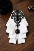 Ornate Black Gem & White Ribbon Bow Tie Brooch