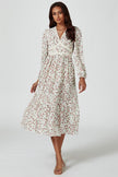 Robe mi-longue à manches longues et imprimé floral blanche