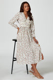 Robe mi-longue à manches longues et imprimé floral blanche