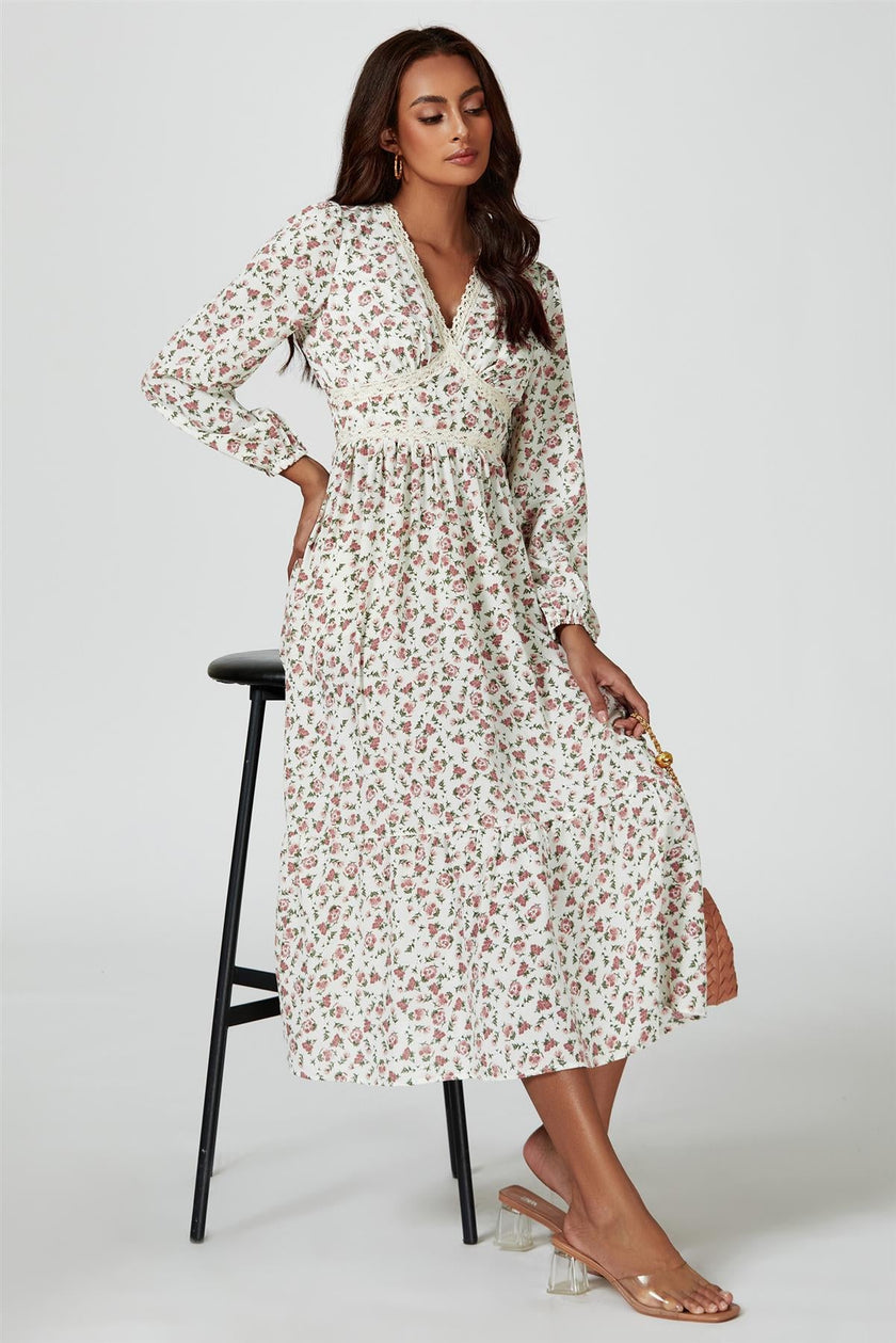 Robe mi-longue à manches longues et imprimé floral blanche