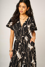 Bleach Effect Print Wrap Top Jumpsuit In Black