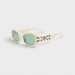 Ovale Sonnenbrille aus Acetat und Metall mit Lorbeer-Detail, Creme/Gold/Lorbeergrün