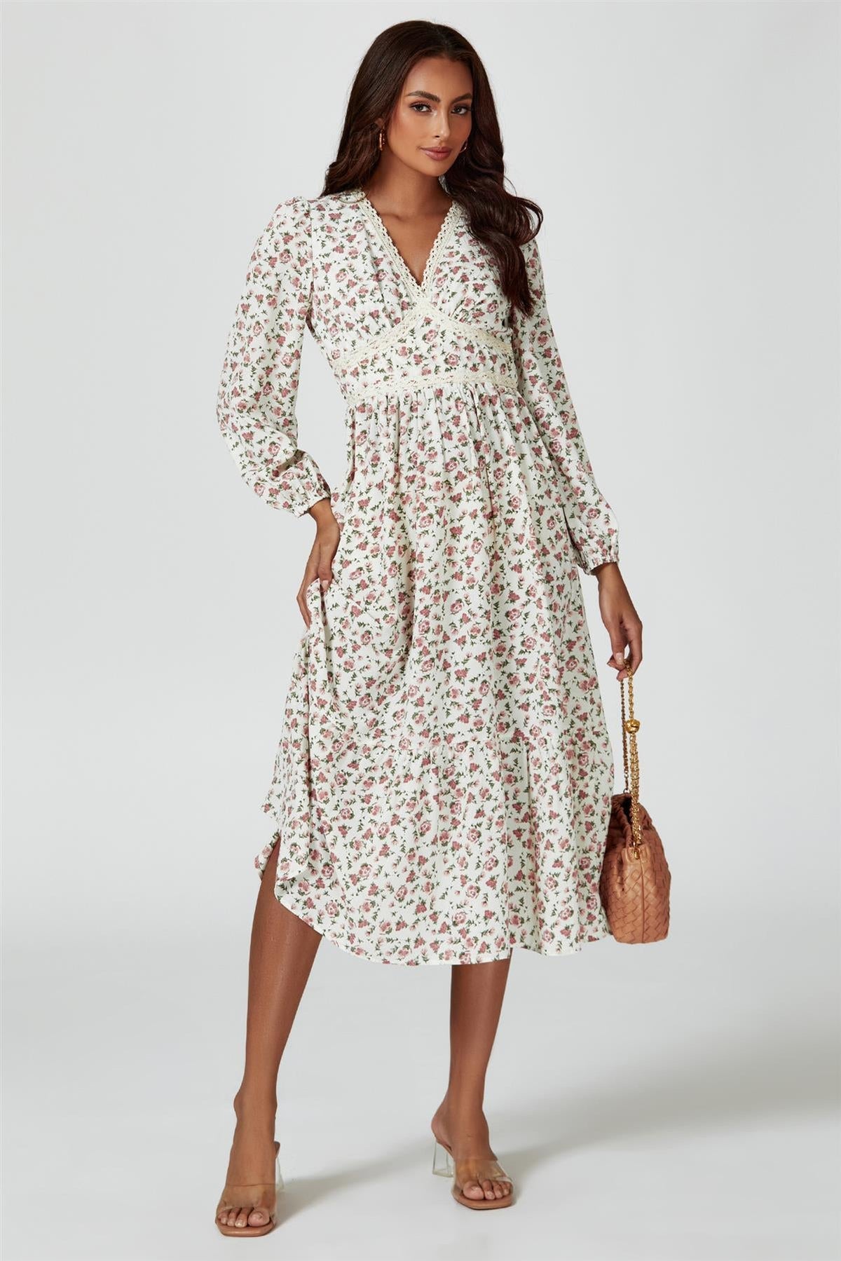 Robe mi-longue à manches longues et imprimé floral blanche