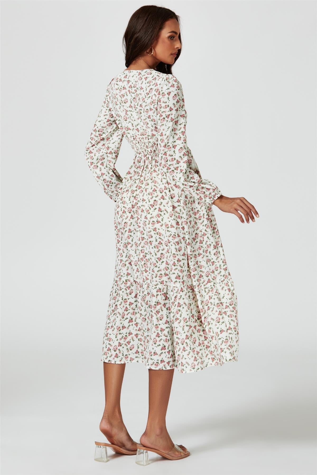 Robe mi-longue à manches longues et imprimé floral blanche