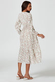 Robe mi-longue à manches longues et imprimé floral blanche