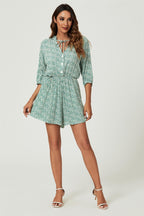Daisy Floral Print Boho Playsuit With Buttons In Green