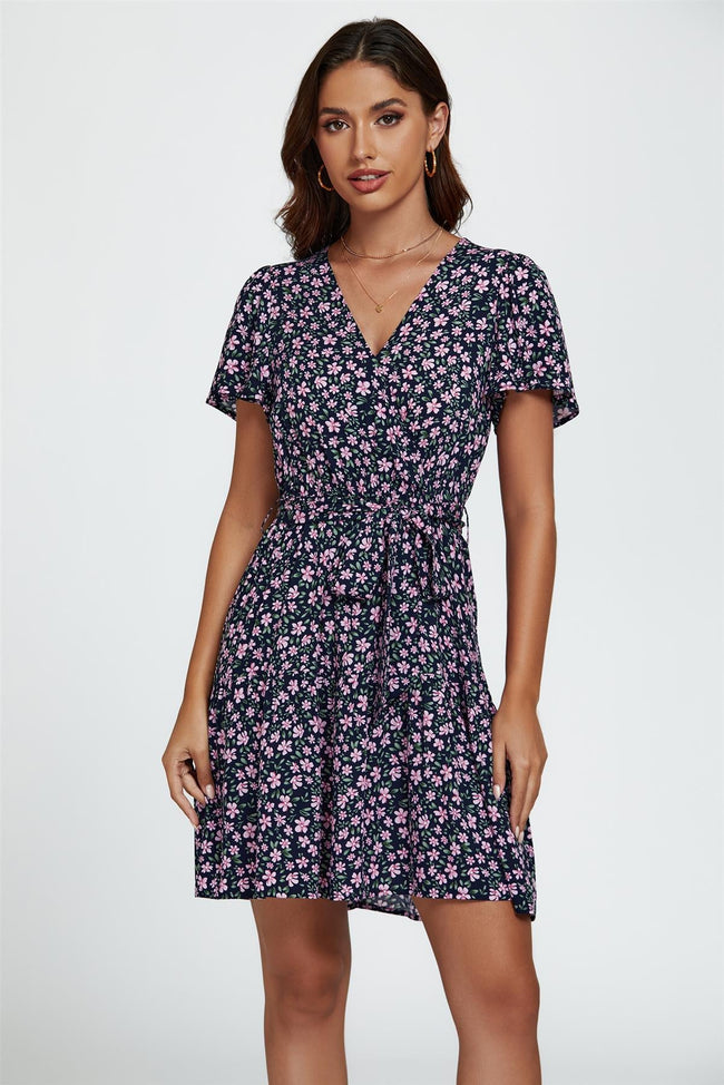 Mini-robe portefeuille étagée à imprimé floral et ourlet, bleu marine