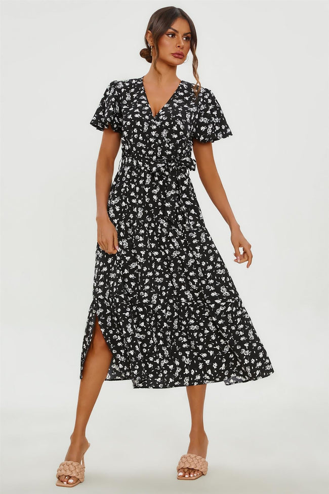 Robe midi portefeuille noire étagée à imprimé floral blanc