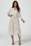 Robe mi-longue à manches longues et imprimé floral blanche