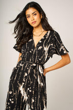 Bleach Effect Print Wrap Top Jumpsuit In Black