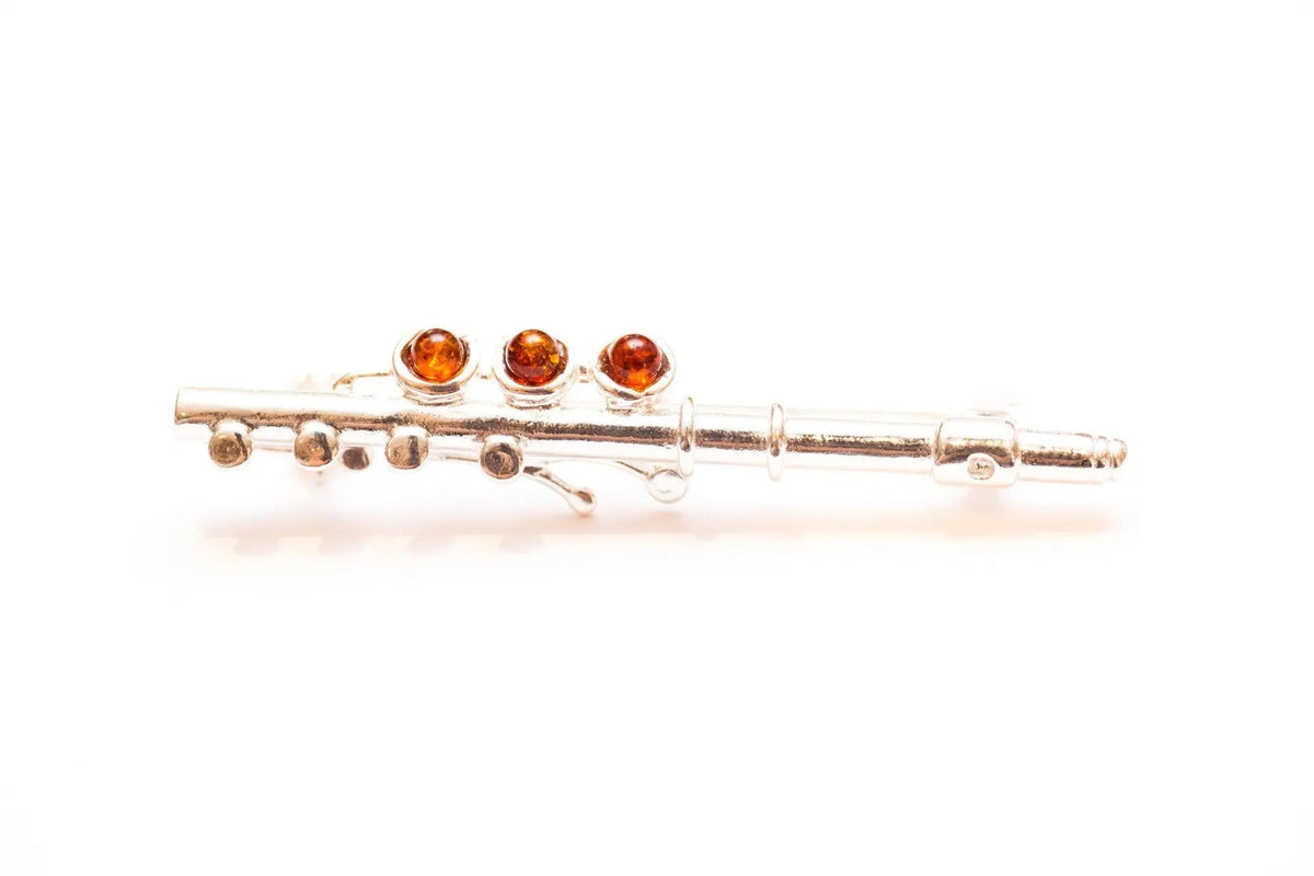 Broche flûte ambre et argent