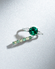 Emerald Round Cut Three Stone Engagement Ring in Sterling Silver
