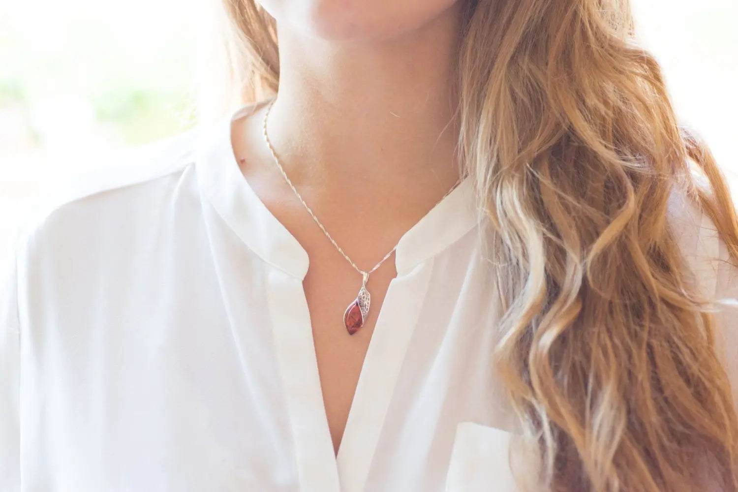 Pendentif fantaisie ambre et argent