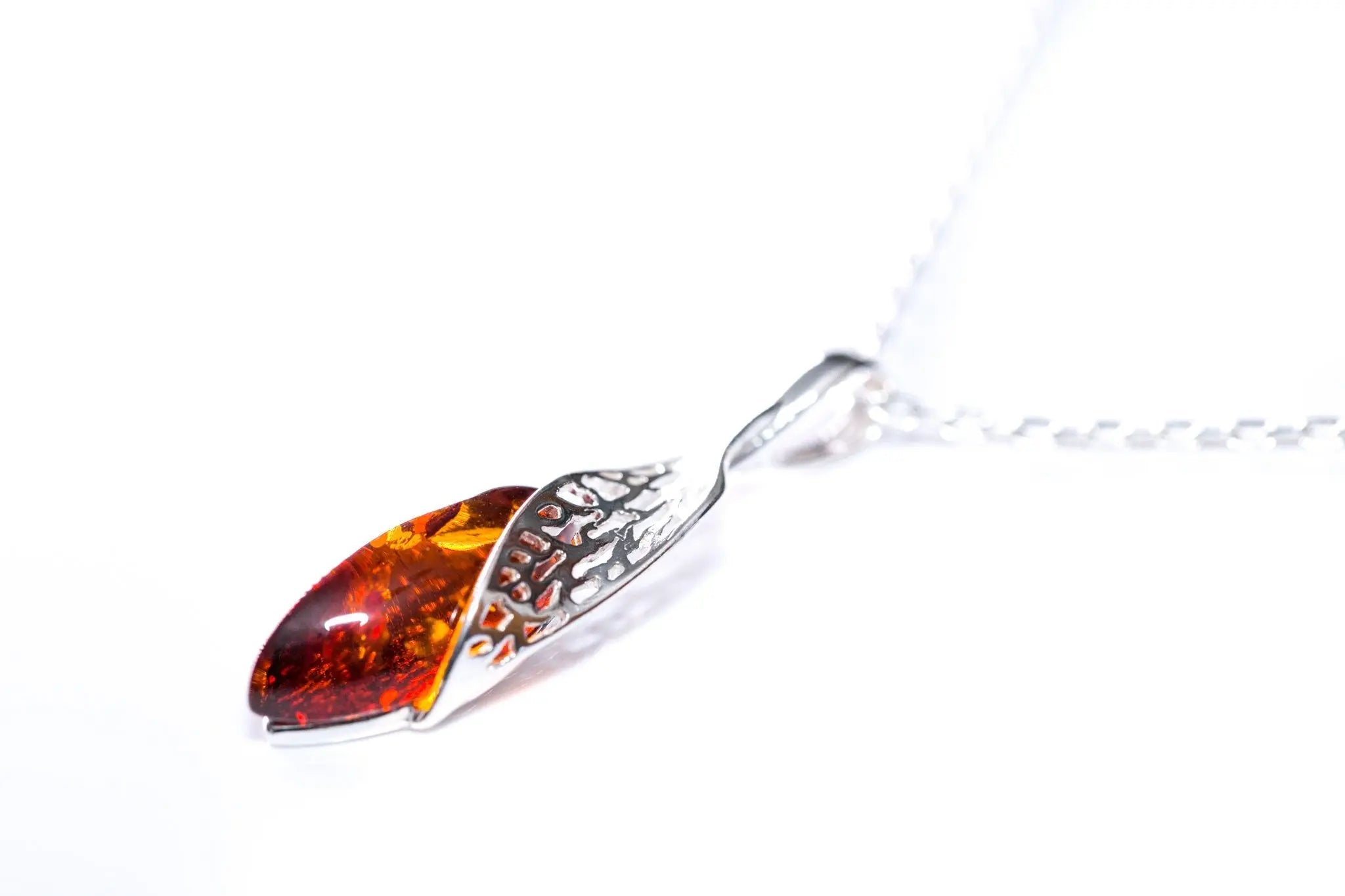 Pendentif fantaisie ambre et argent