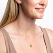 Elements Gold Peridot Oval Ridged Pendant