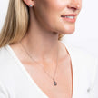 Elements Gold Fancy Cut Sky Blue Topaz Flower Bud Pendant