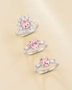 Pink Sapphire Oval Cut Three Stone Engagement Ring in Sterling Silver