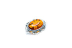 Broche ovale classique en ambre encadré