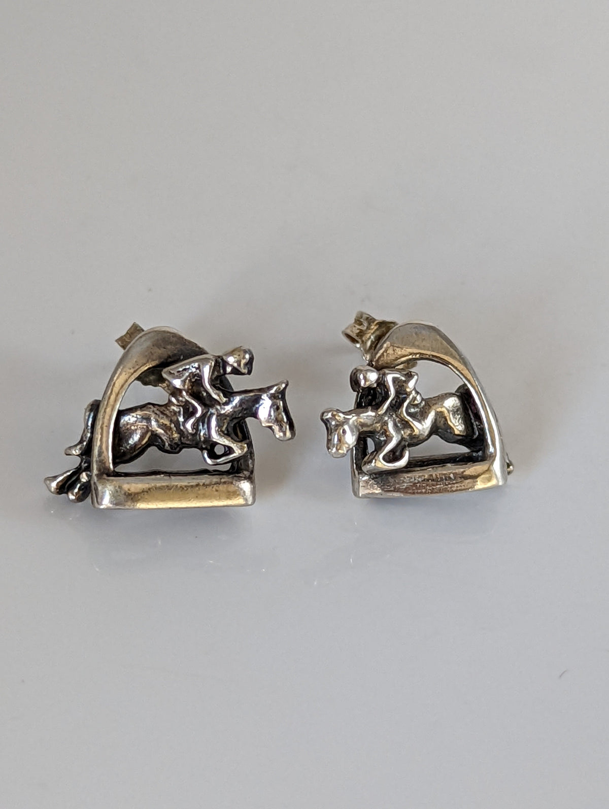 Silver Steed 3D Jump over the Stirrup Stud Earrings