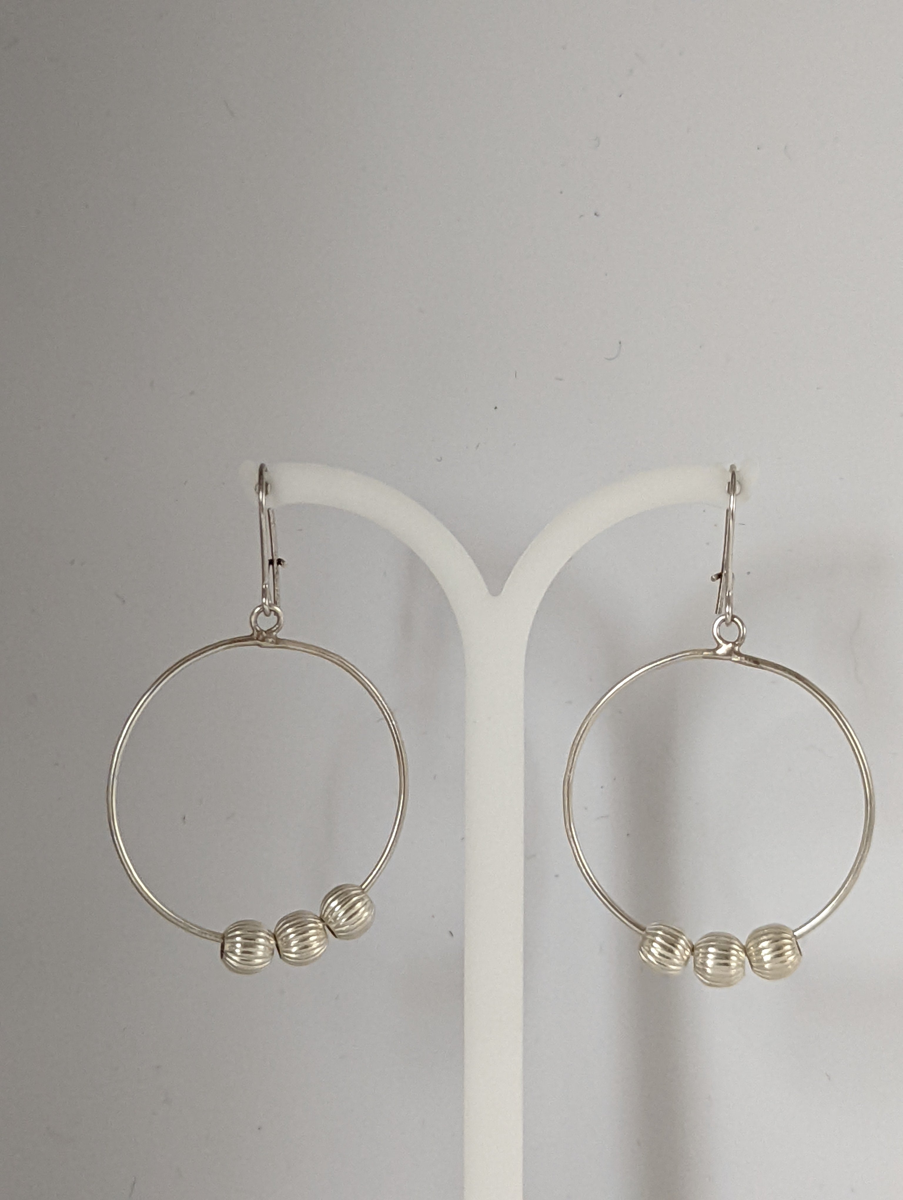Silver Steed Loop with Buds Dangling Earrings