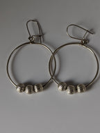 Silver Steed Loop with Buds Dangling Earrings