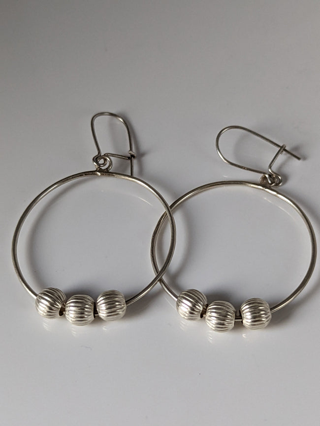 Silver Steed Loop with Buds Dangling Earrings