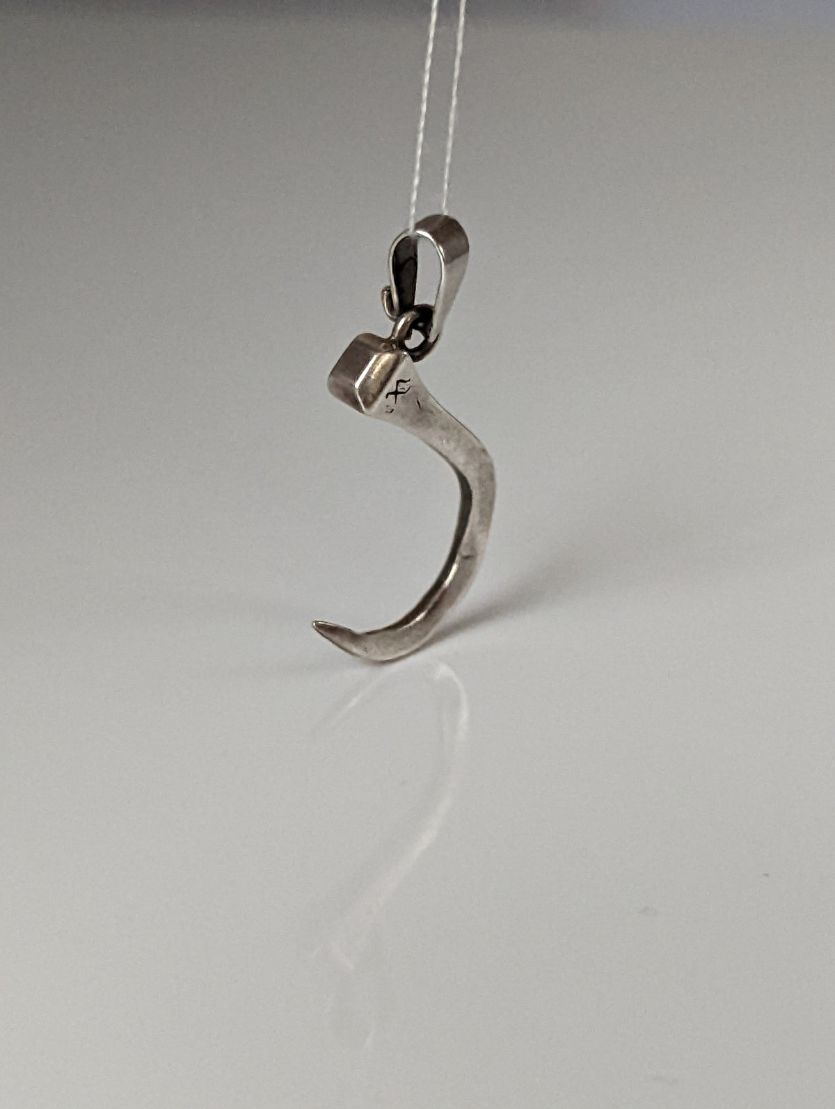 Silver Steed Curved Horseshoe Nail Silver Pendant