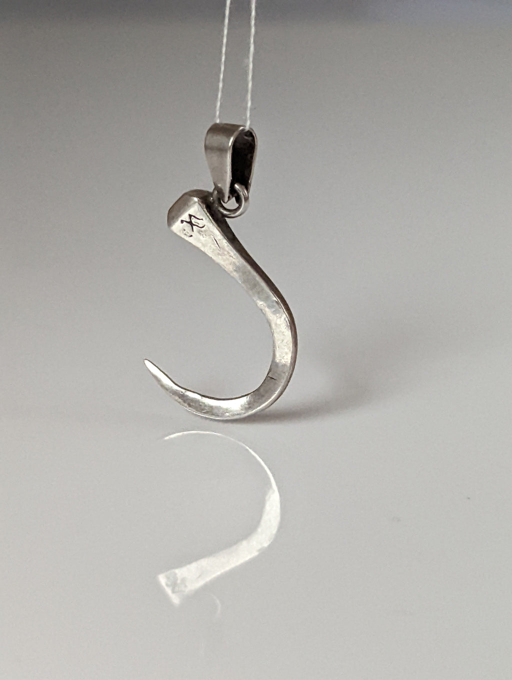 Silver Steed Curved Horseshoe Nail Silver Pendant