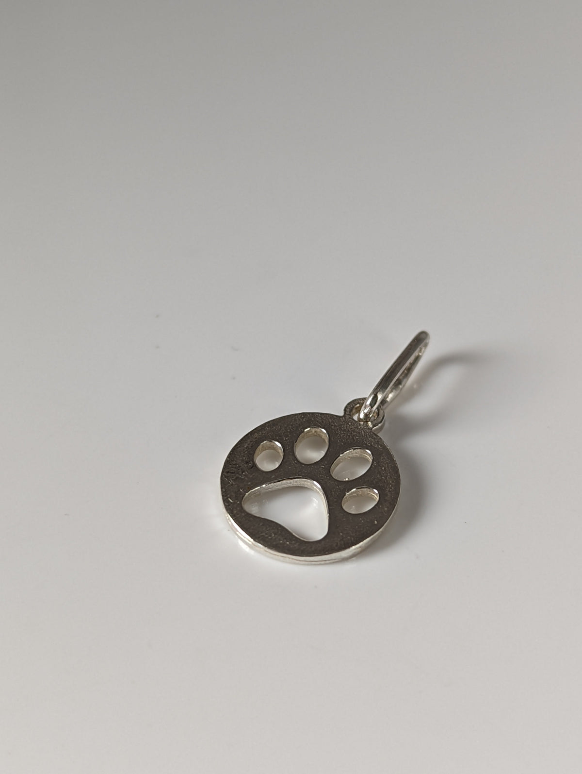 Silver Steed Round Paw Print Tag Silver Pendant