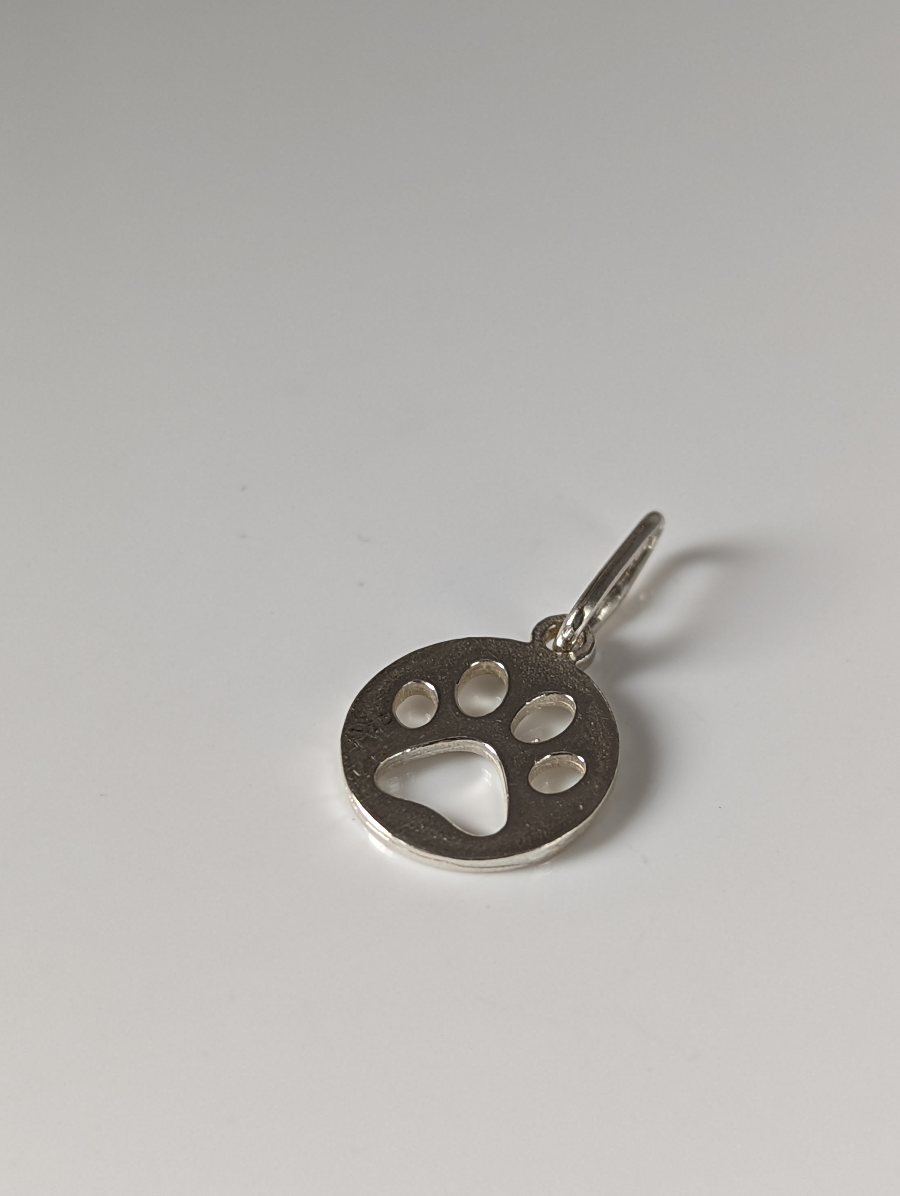 Silver Steed Round Paw Print Tag Silver Pendant