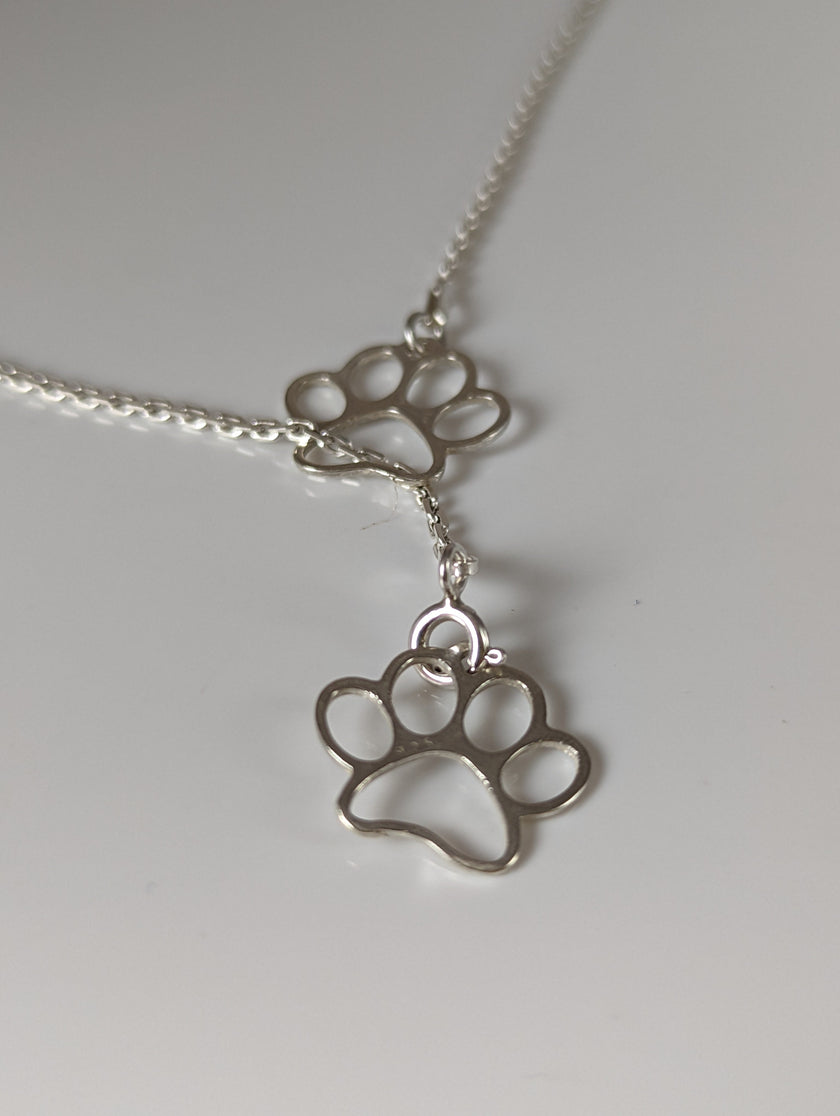 Silver Steed Thread Through Double Paw Print Silver Necklace