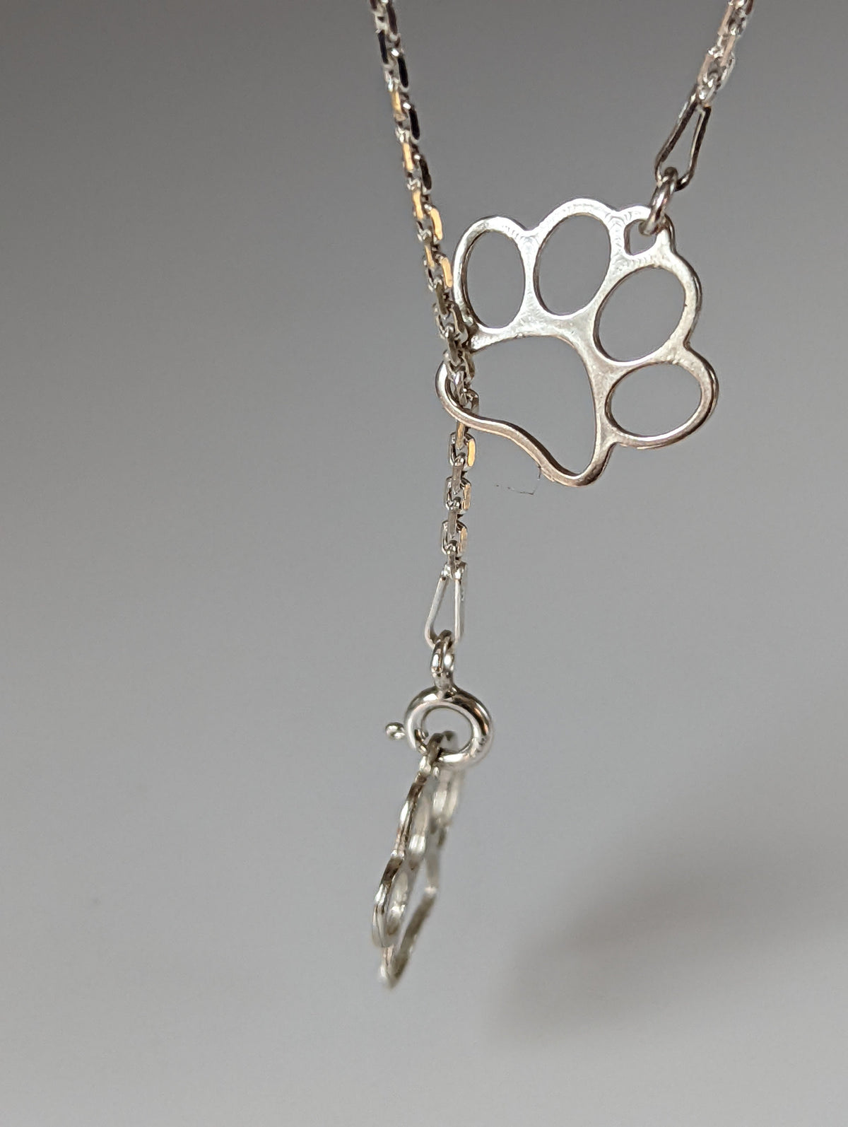 Silver Steed Thread Through Double Paw Print Silver Necklace