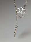 Silver Steed Thread Through Double Paw Print Silver Necklace