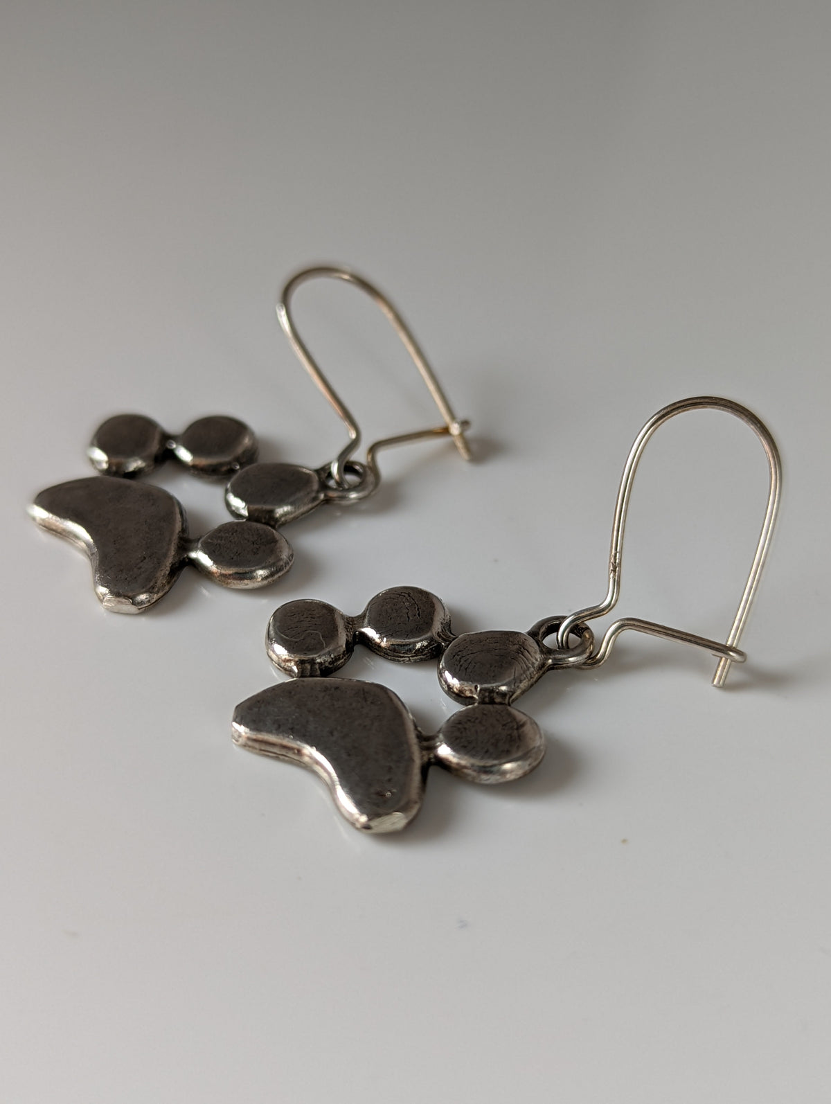 Silver Steed Paw Print Silver Dropped Earrings