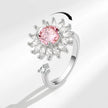 Anillo giratorio ajustable de flor rosa