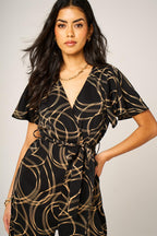 Abstract Line Print Wrap Top Jumpsuit In Black