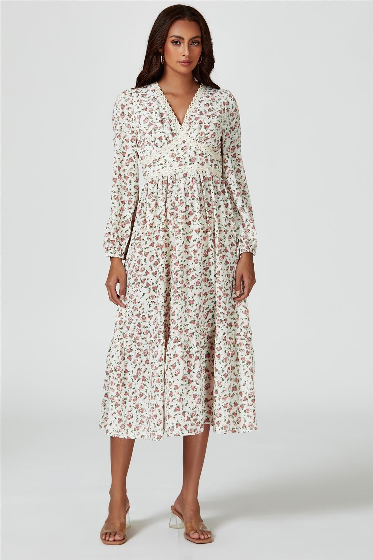 Robe mi-longue à manches longues et imprimé floral blanche