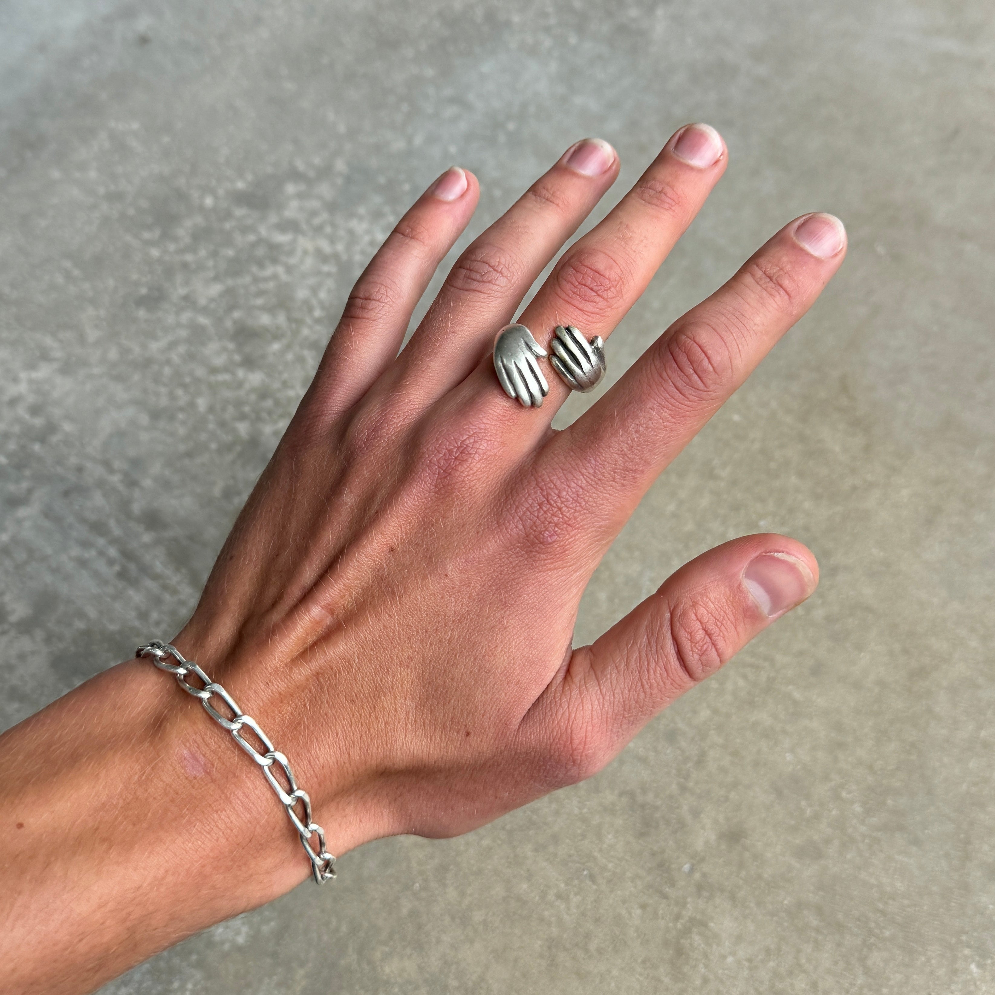 Double Hugged Hands Silver Ring