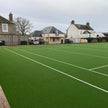 Gazon synthétique pour courts de tennis
