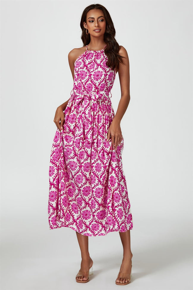 Robe longue rose à imprimé floral, décolleté licou à nouer
