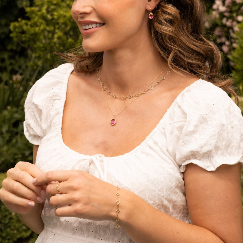 Elements Gold Oval Cut Pink Topaz Pendant