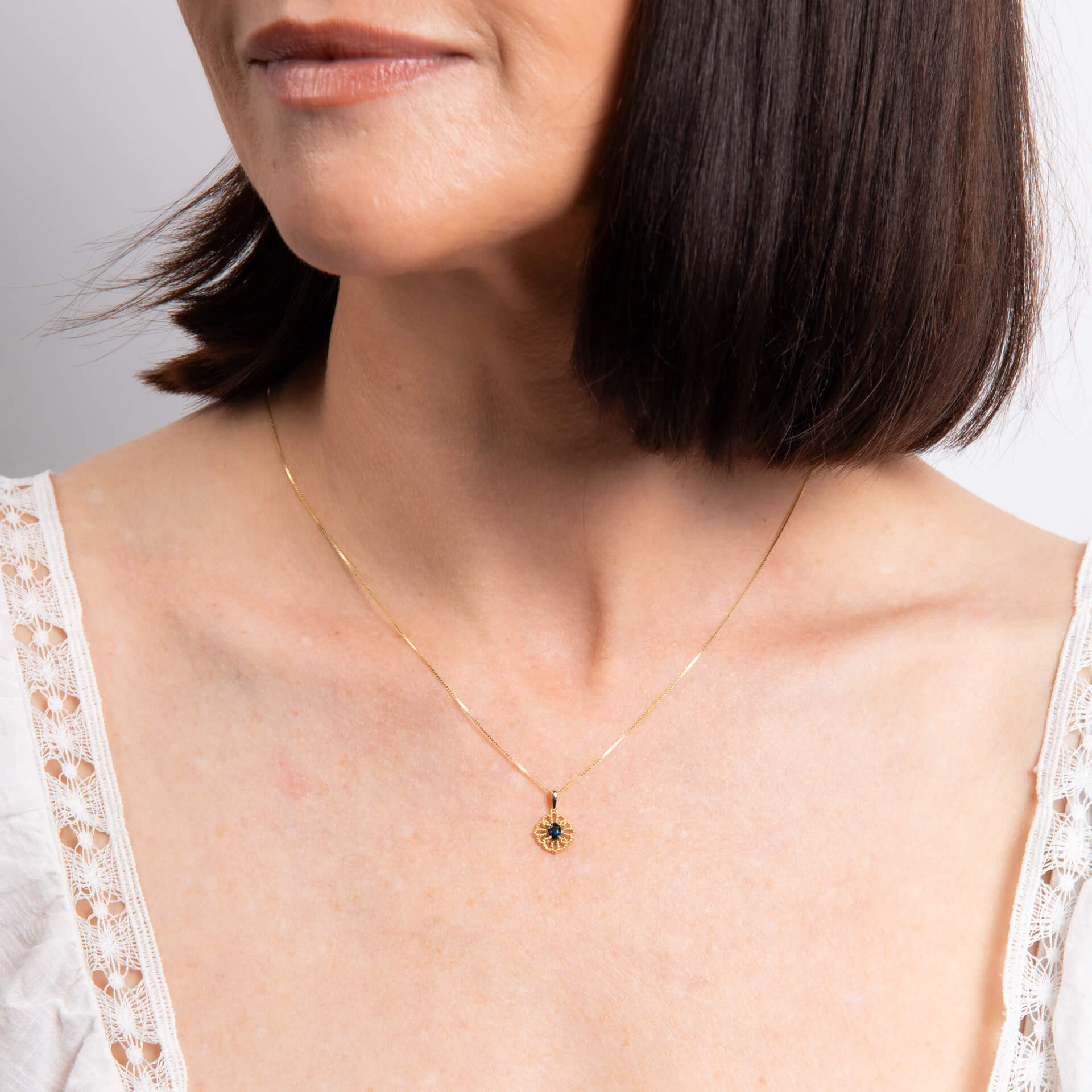 Elements Gold Ornate Sapphire Pendant