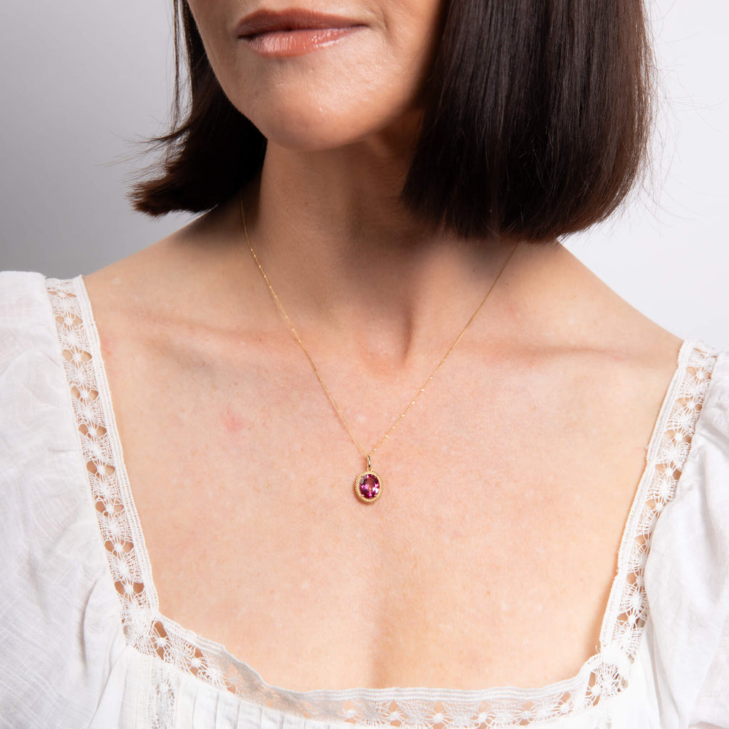 Elements Gold Oval Cut Pink Topaz Pendant